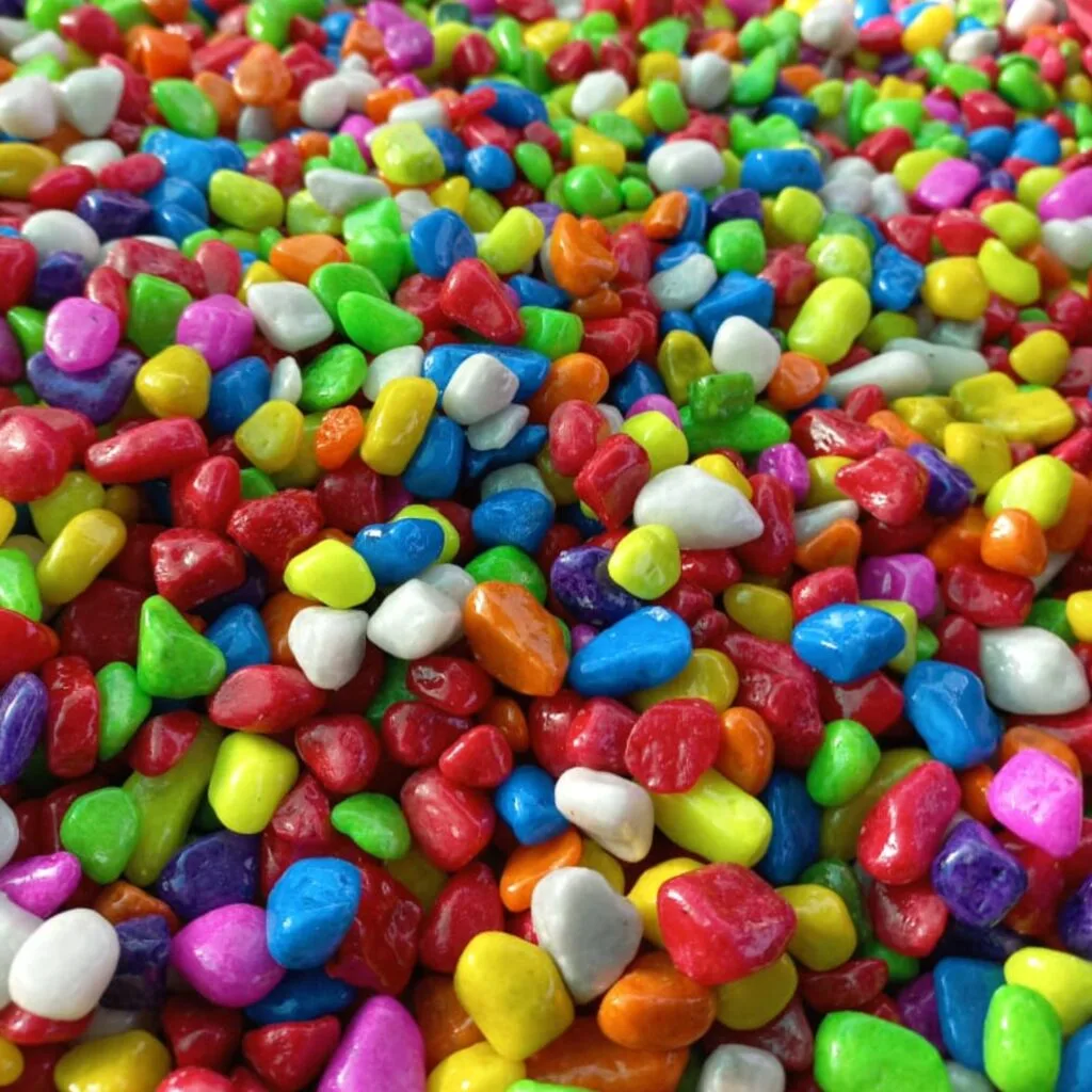 Polished colorful pebbles and non-toxic decorative gravel for aquariums, terrariums, and home décor from Stone & Rock Pebbles Bangalore.
