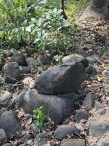 Big boulders arranged for outdoor meditation corner